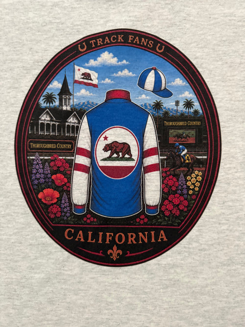 A circular graphic print on a light heather gray fabric, featuring a California U track and racing theme with a blue and white varsity jacket, California flag, racetrack, flowers, and a blue-and-white cap.
